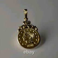 10K Solid Yellow Gold Coin Weight 2.39 Grams Length 1.4 Inches Long. 75inch Wide