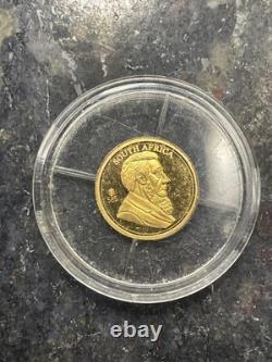 14k Gold coin. 05 grams. Gold South Africa 50 year Krugerrand