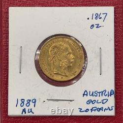 1889 Austria 20 Francs, 8 Florins Gold Coin, AU. 6.4516 Grams. 1867 Oz