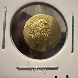 2023 GOLD COOK ISLANDS 0.5 GRAM. 9999 FINE $5 ZEUS GREEK COIN Rare