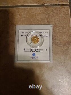 American Mint Gold Coin. 585 Proof 0.5 grams Great Am. Presidents withCOA