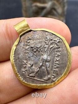 Ancient 18k gold pendant with a Greek Roman silver coin rare 7.1 grams