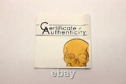 CIT Palau GOLD SKULL 0.5 Gram $1 Coin with Certificate of Authenticity