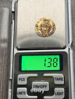 Gold coin 1.38 grams. 2.1 2.2 cm diameter