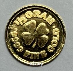 Monarch Precious Metals 1/2 Gram. 9999 Gold Four Leaf Clover Round Capsule