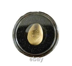 Palau 1/2 gram Golden Dragon Concave Egg Shape Proof