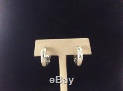 Roberto Coin 18 K Diamond Huggie Earrings 10.7 grams. 42 diamond carats