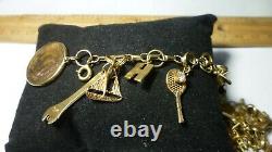 Vintage 14k Gold 7 Charm Bracelet With (25) Charms, 25.8 Grams Coin