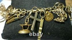 Vintage 14k Gold 7 Charm Bracelet With (25) Charms, 25.8 Grams Coin