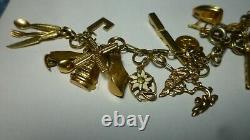 Vintage 14k Gold 7 Charm Bracelet With (25) Charms, 25.8 Grams Coin